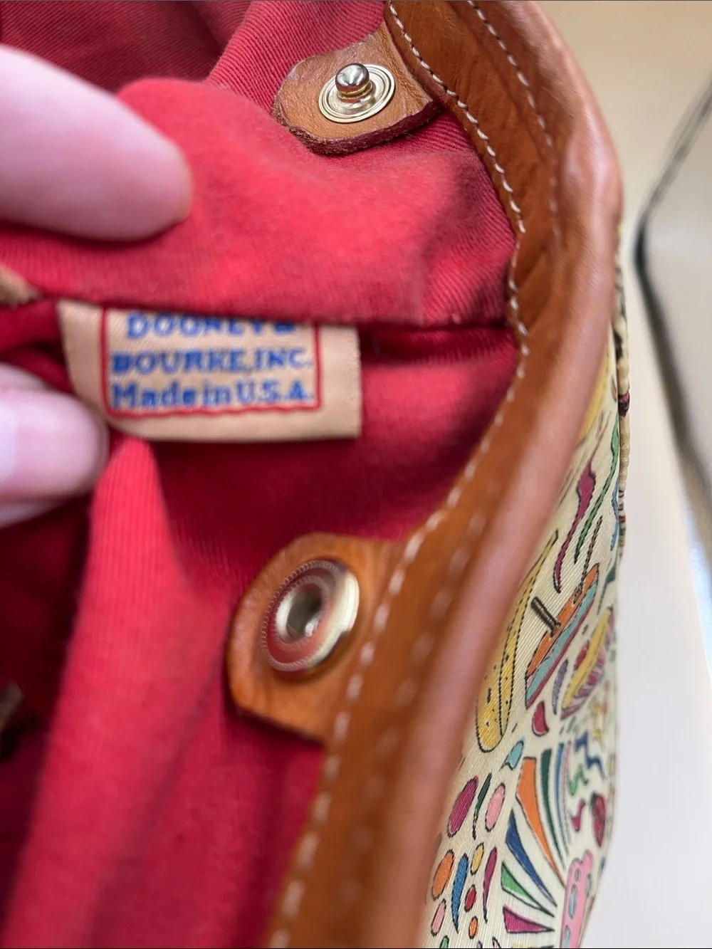 Dooney & Bourke playful doodle